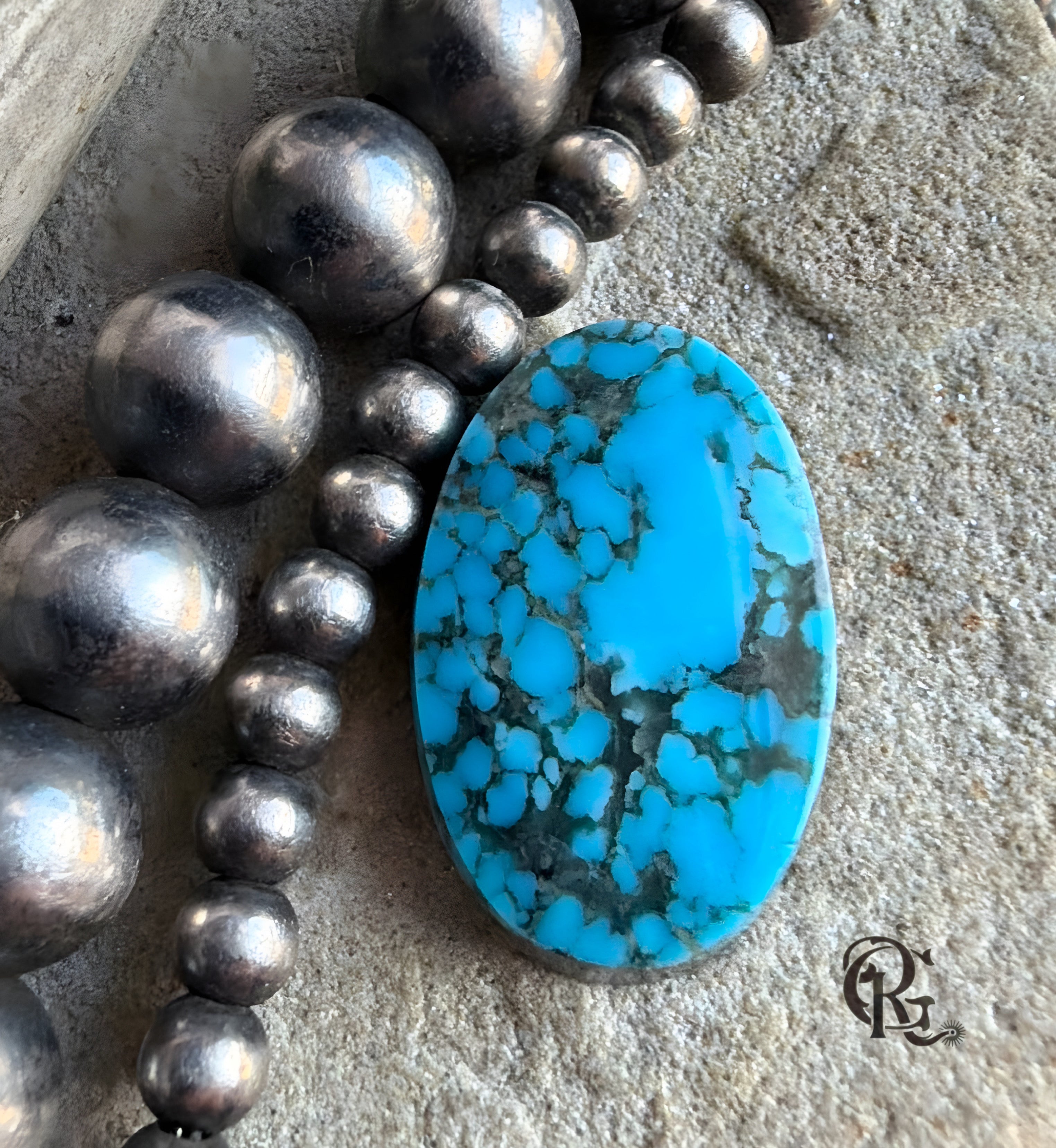 Ithaca Peak Turquoise Blue Oval Cabochon With Black Matrix