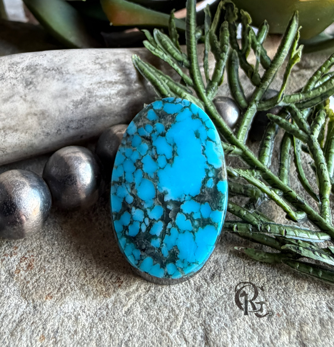 Ithaca Peak Turquoise Blue Oval Cabochon With Black Matrix