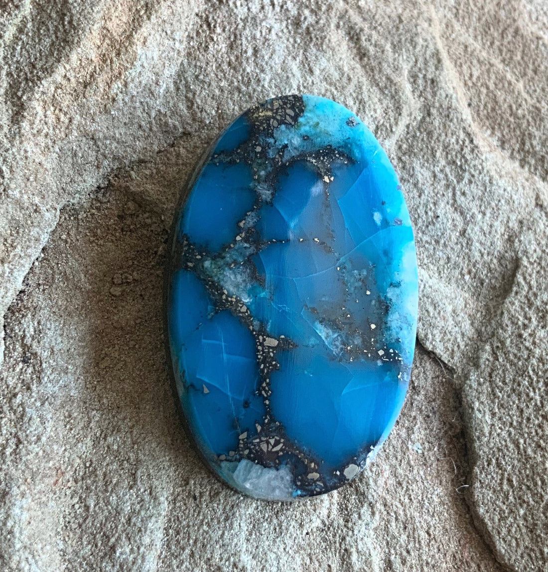 High Grade Ithaca Peak Turquoise Oval Cabochon With Quartz & Pyrite Inclusions