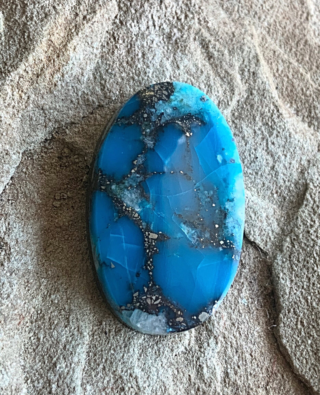 High Grade Ithaca Peak Turquoise Oval Cabochon With Quartz & Pyrite Inclusions
