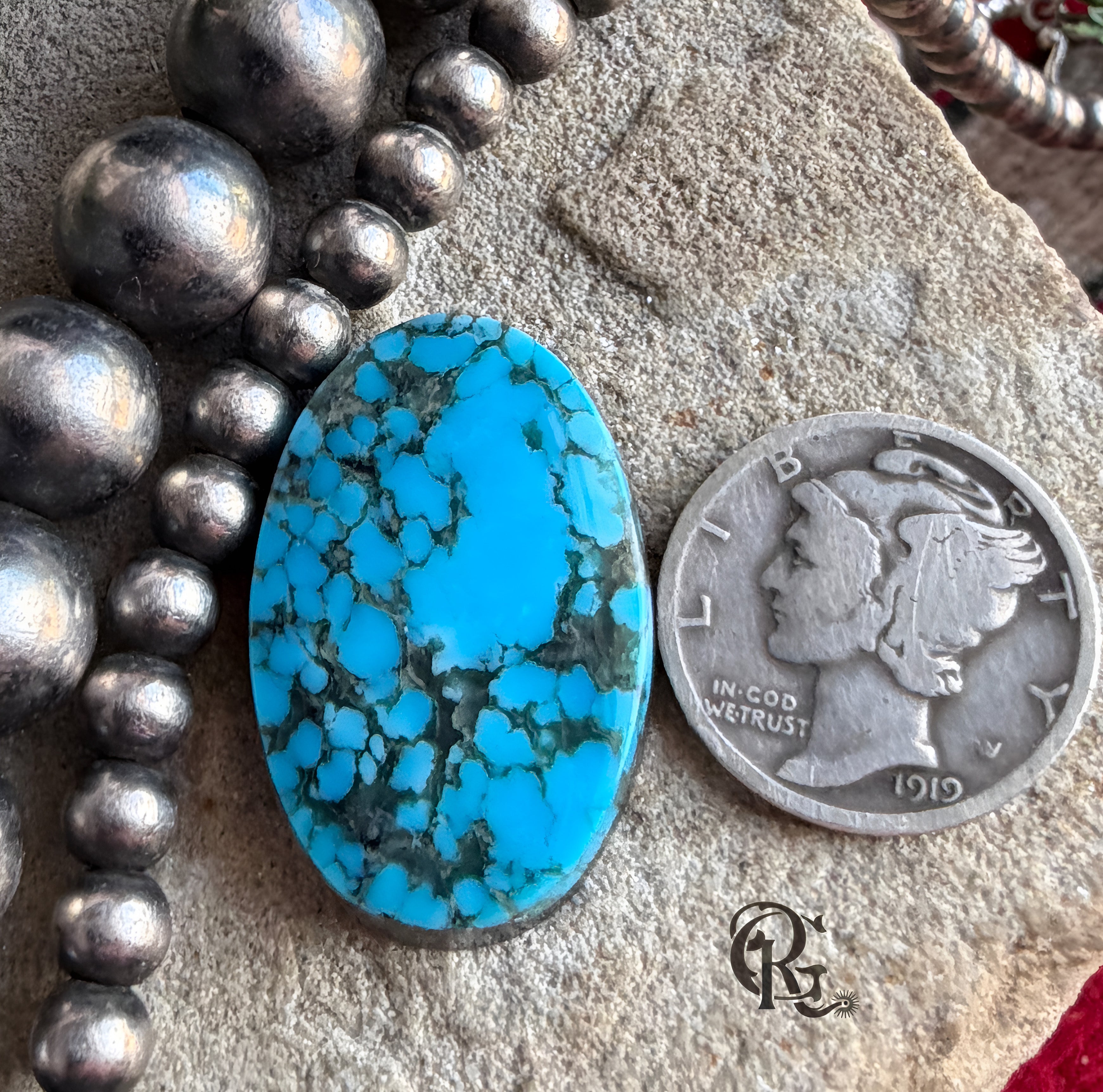 Ithaca Peak Turquoise Blue Oval Cabochon With Black Matrix