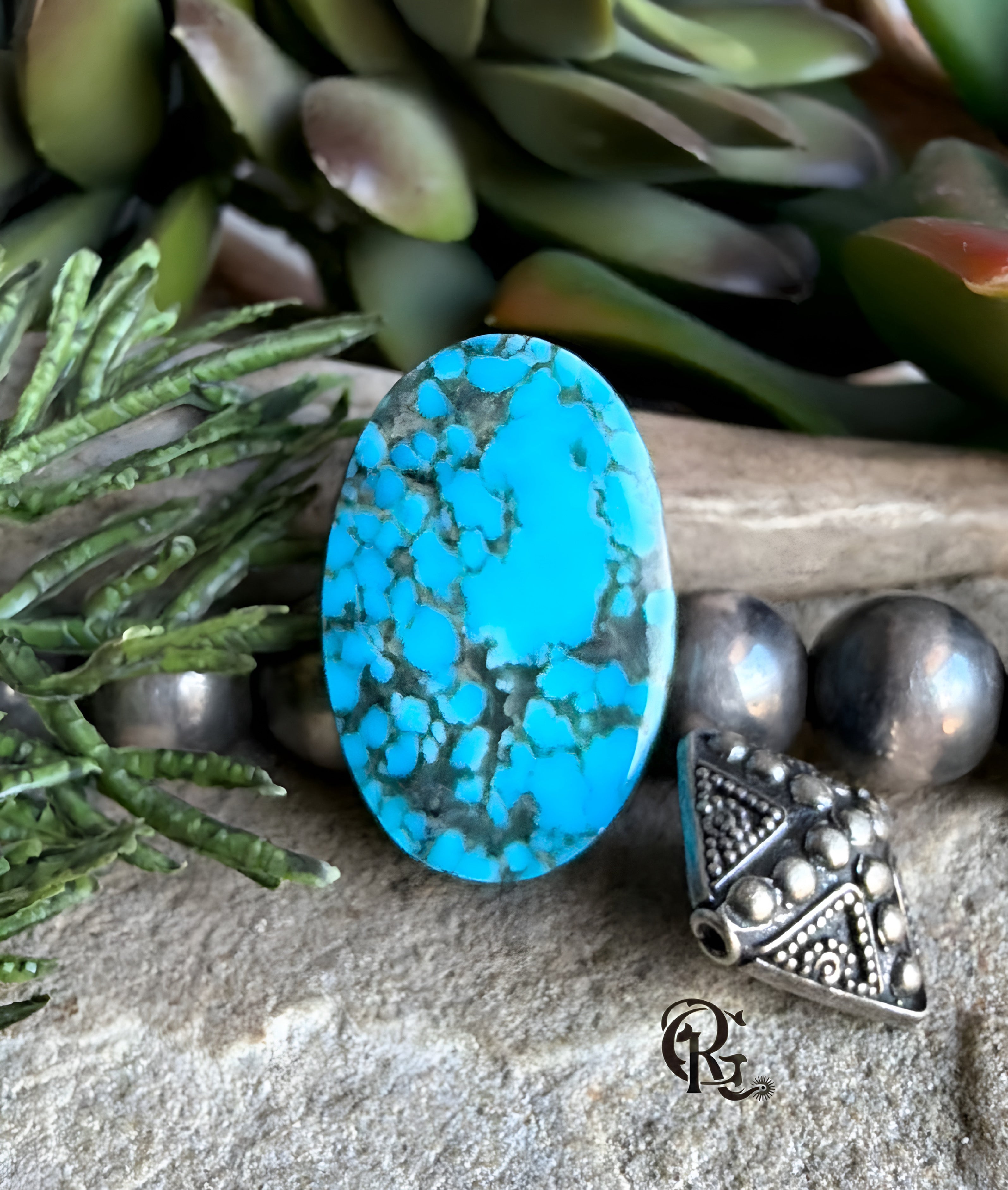 Ithaca Peak Turquoise Blue Oval Cabochon With Black Matrix