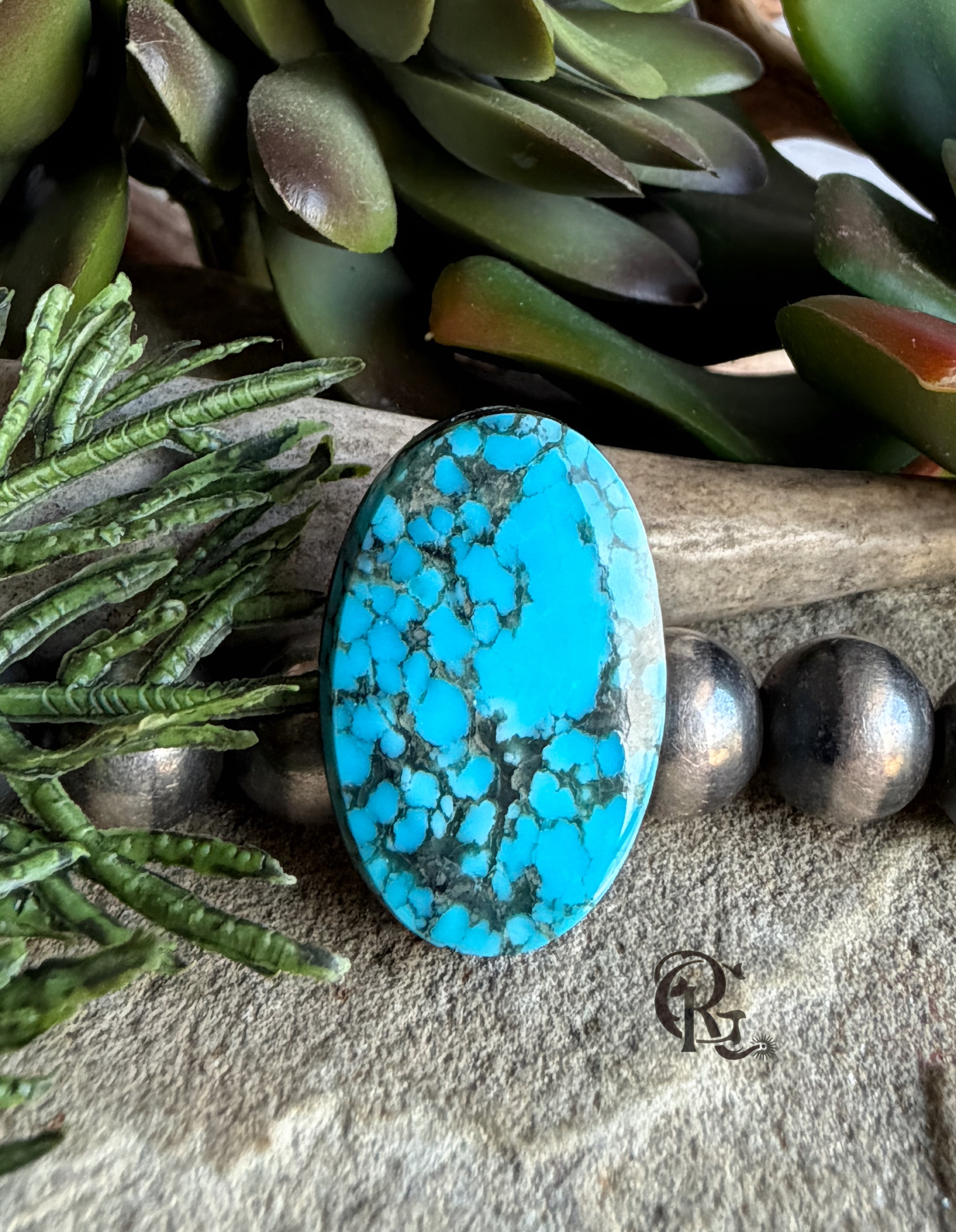 Ithaca Peak Turquoise Blue Oval Cabochon With Black Matrix