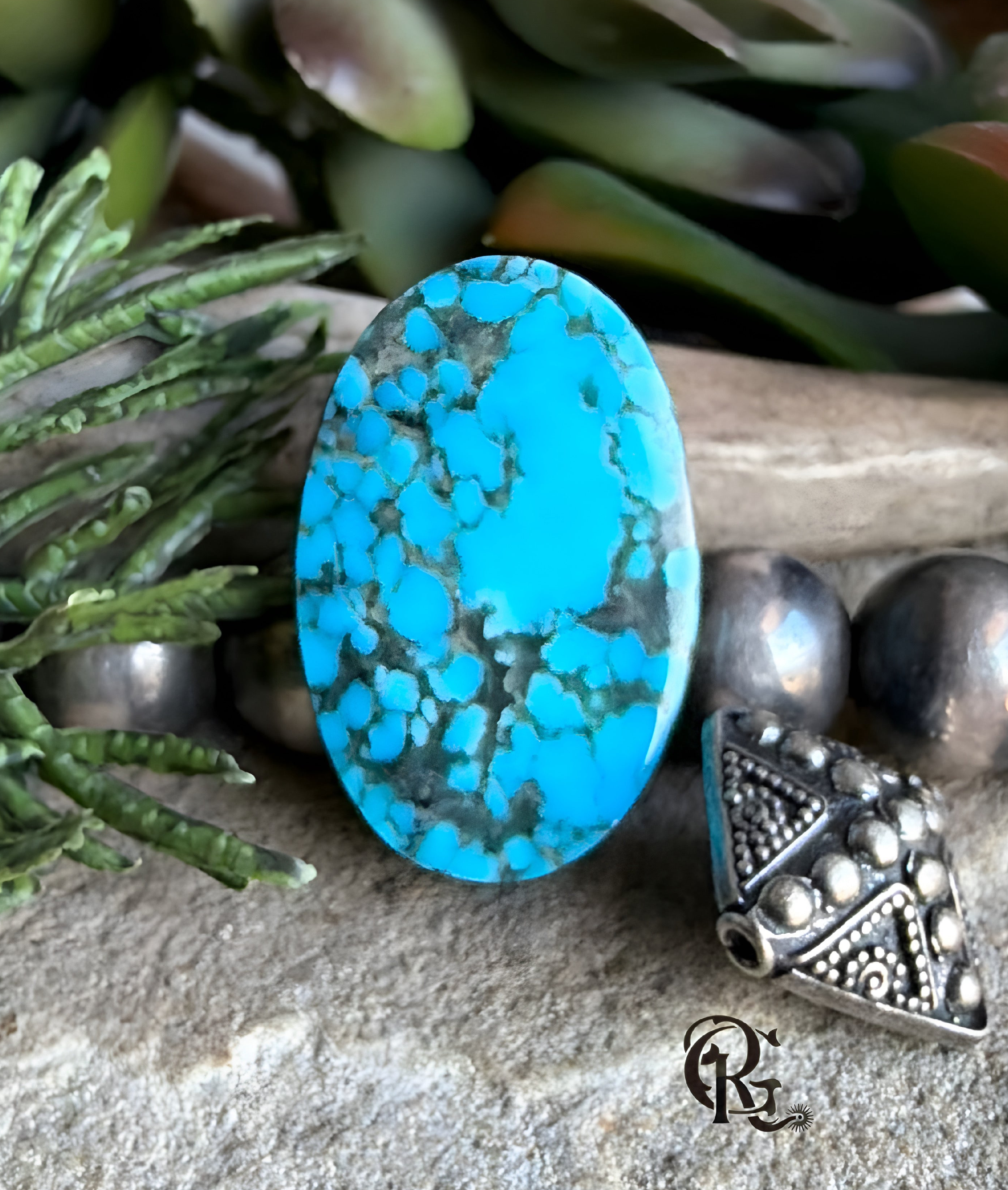 Ithaca Peak Turquoise Blue Oval Cabochon With Black Matrix