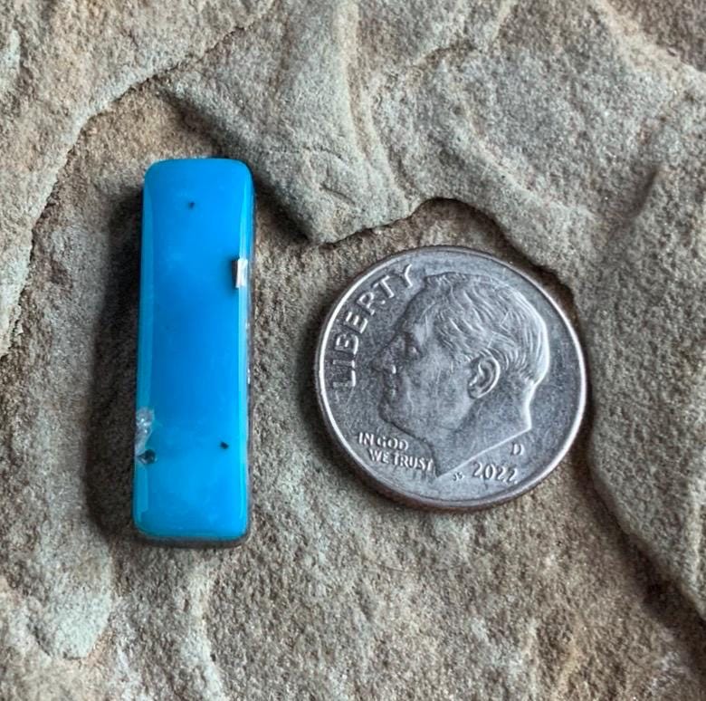 Incredible Ithaca Peak Turquoise High Grade Cabochon with Pyrite and Quartz Inclusions