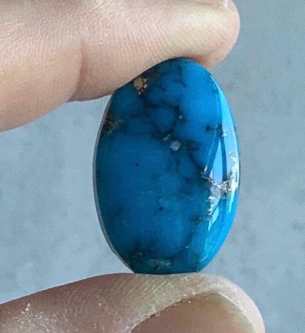 Ithaca Peak High Grade Oval Turquoise Cabochon With Silver Pyrite IP137